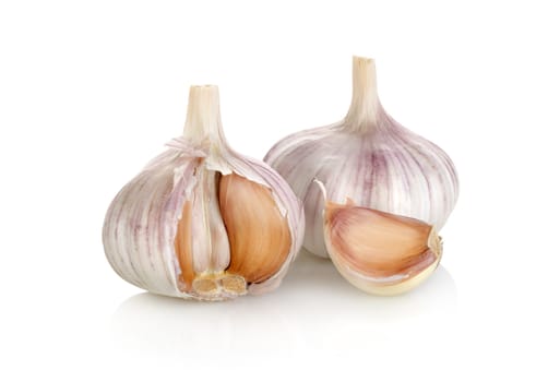 Raw garlic isolated on a white background