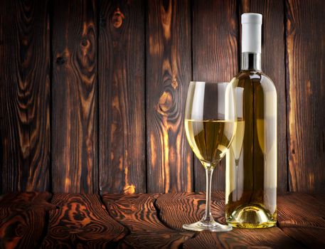 Desser white wine on a wooden background