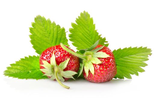 Ripe strawberries with leaves isolated on white background