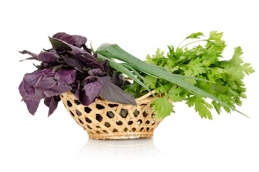 Basket of vegetables isolated on a white background