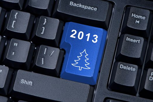 Button computer keyboard with a Christmas tree and figures 2013