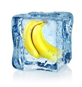 Ice cube and banana isolated on a white background