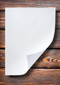 Sheet of paper on a wooden table