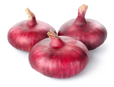 Three red onions isolated on white background