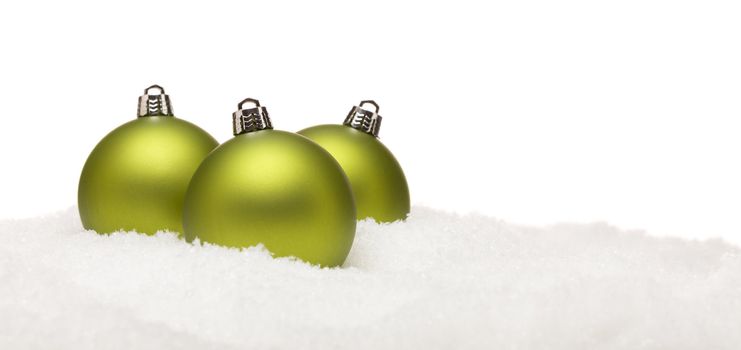 Three Green Christmas Ornaments on Snow Flakes on a White Background- Great for a Base Image.