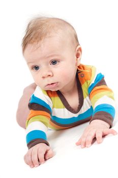 Shot of little baby boy in striped clothes