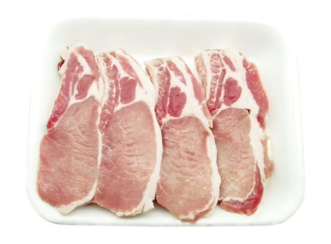 Pork chops packed in a container