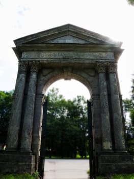 ancient gate in an arch entrance to the park