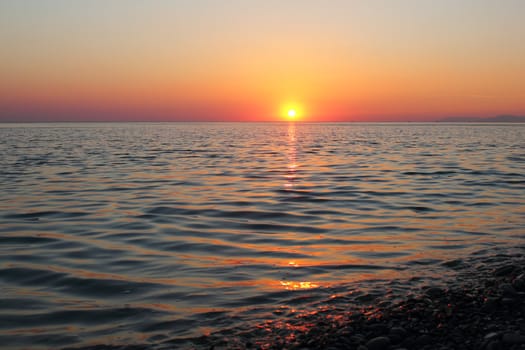 Sunset on the sea coast.