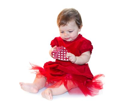 portrait of baby girl in red