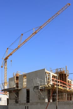 a crane at a construction site office real estate