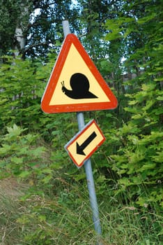 A sign warning of the snails