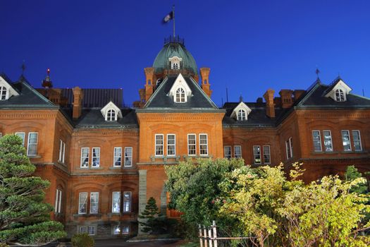 The Former Hokkaido Government Office Building  constructed in 1888, The Japanese nickname is Akarenga or "Red Brick" with scenic night illumination, Sapporo, Japan