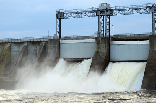 Water pouring out of the hatches in a hydroelectric power station