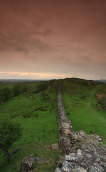 The ancient roman remains of hadrians wall on the english scotish boarder in the un ited kingdom