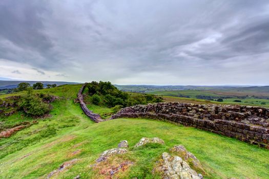 The ancient roman remains of hadrians wall on the english scotish boarder in the un ited kingdom