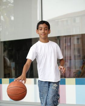 Portrait of boy with the ball.