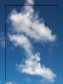 A border imprint on a morning shot of a cloudy blue sky