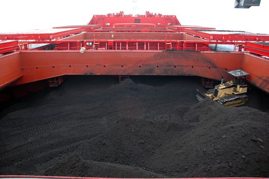 coal in the hold of tankers