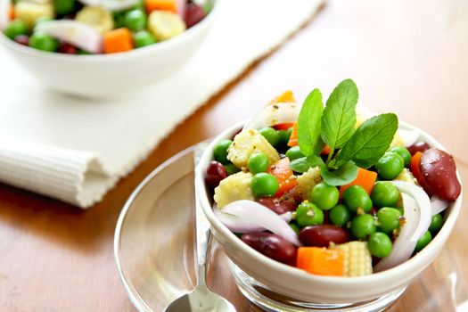 Beans with peas ,baby corn and carrot  salad