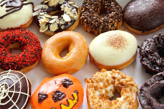 Varieties of decorated donuts