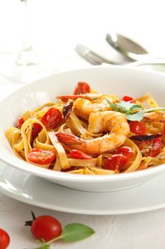 Fettuccine with prawn in tomato sauce