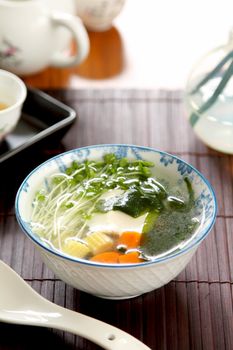 Fresh Tofu with seaweed and vegetables soup [Japanese cuisine]