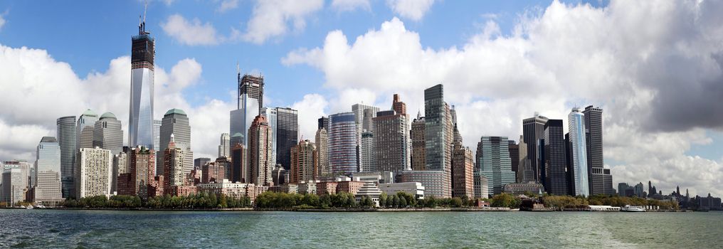 NEW YORK CITY - OCT 10: A general view of lower New York City - Manhattan from ferry in a cloudy morning, in New York City, October 10, 2012.