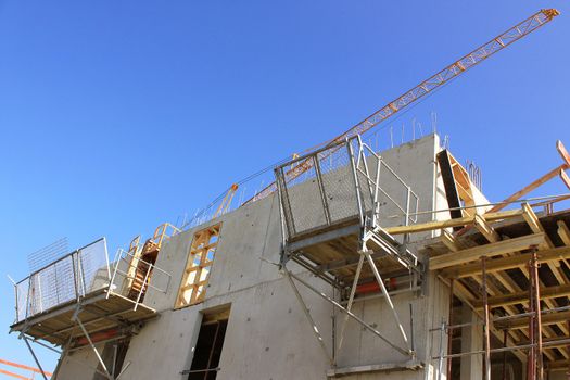 a crane at a construction site office real estate