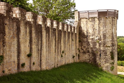 ramparts or fortifications and moat of a castle from medieval times