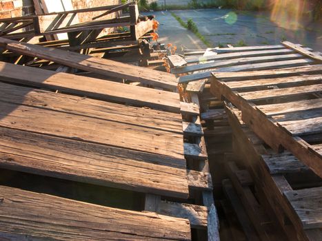 Wooden shipping pallets stacked as industrial trash