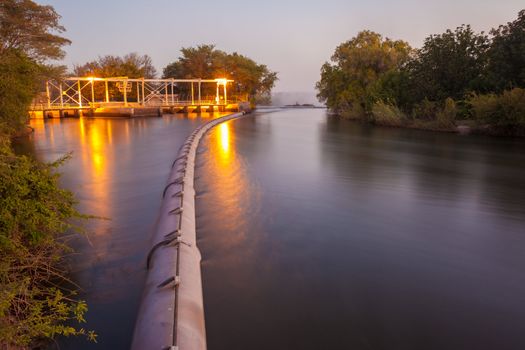 The Zambezi River at dusk, seen from Zambia