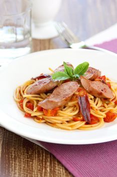 Pasta with sausage ,tomato and dried chilli