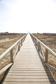 lonely wooden footbridge in Zahara de los Atunes Cadiz Andalusia Spain