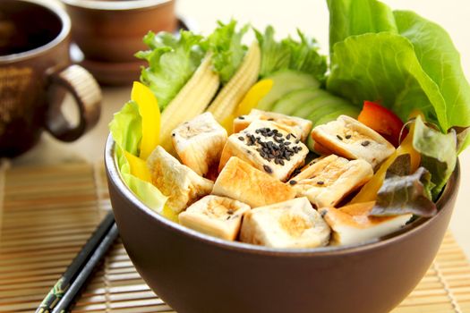 Tofu salad with varieties of vegetables and black sesame