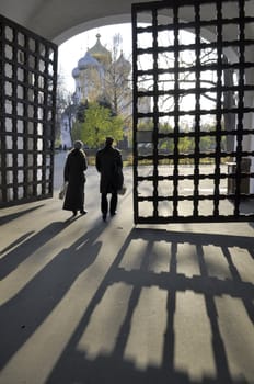 people on the entrance gate of famous Novodevichy Convent in Moscow