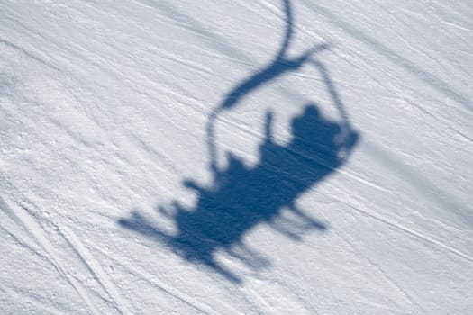 ski lift shadow on the snow