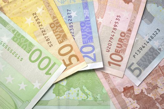 Euro currency background with different kind banknotes and European map