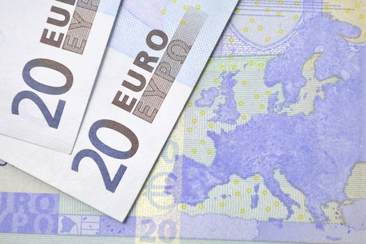 banknotes of 20 Euro on the European map background