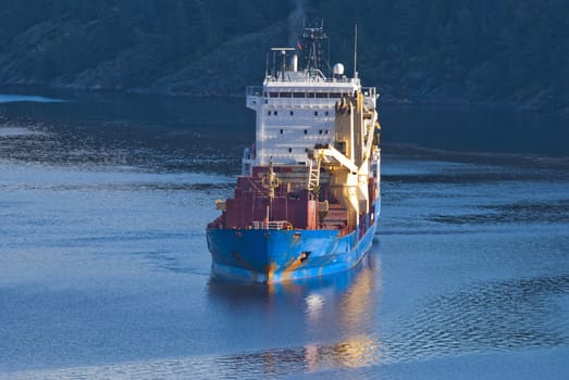 ringdalsfjord is a boundary fjord of norway and sweden, it extends from the oslo fjord and to halden, where it goes into iddefjord, picture is shot from svinesund bridge and shows bbc europe on the way out of the fjord, bbc europe is a cargo ship, is 120X20 meters and sails under antigua barbuda [ag] flag.