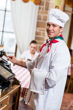 cook inserts the card into a computer terminal, against visiting the restaurant