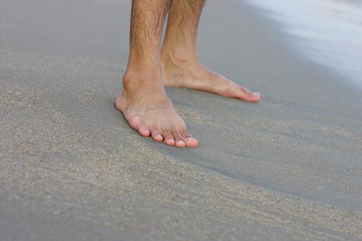 Feet on a Sand