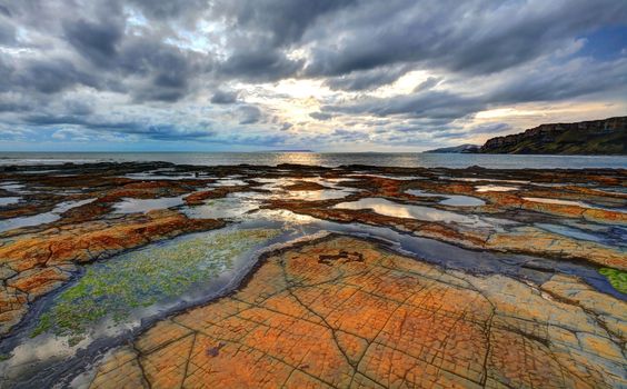 Sunlight at Kimmeridge Bay on the southern british coast line in Dorset