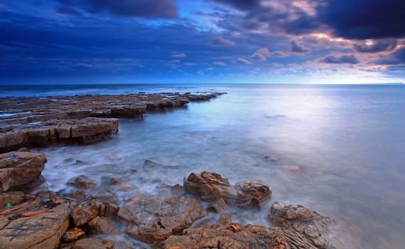 Sunlight at Kimmeridge Bay on the southern british coast line in Dorset