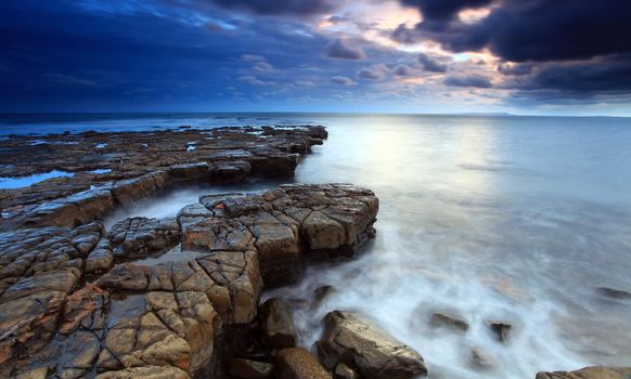 Sunlight at Kimmeridge Bay on the southern british coast line in Dorset