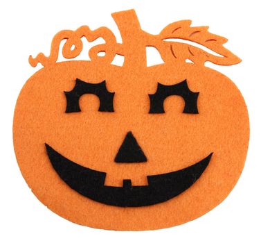 Felted orange and black halloween decoration on white