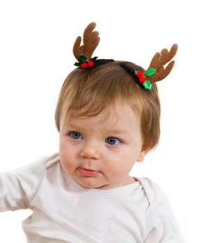 cute little baby with reindeer hat 