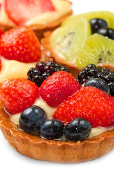 Fresh fruit tart on white background