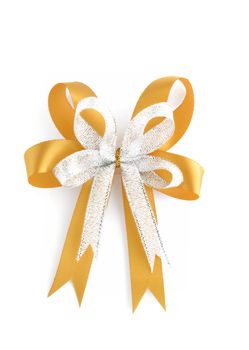 Shiny gold and silver Christmas gift bow decoration isolated on white