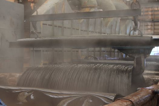 Large spools of Steel Coils being moved.